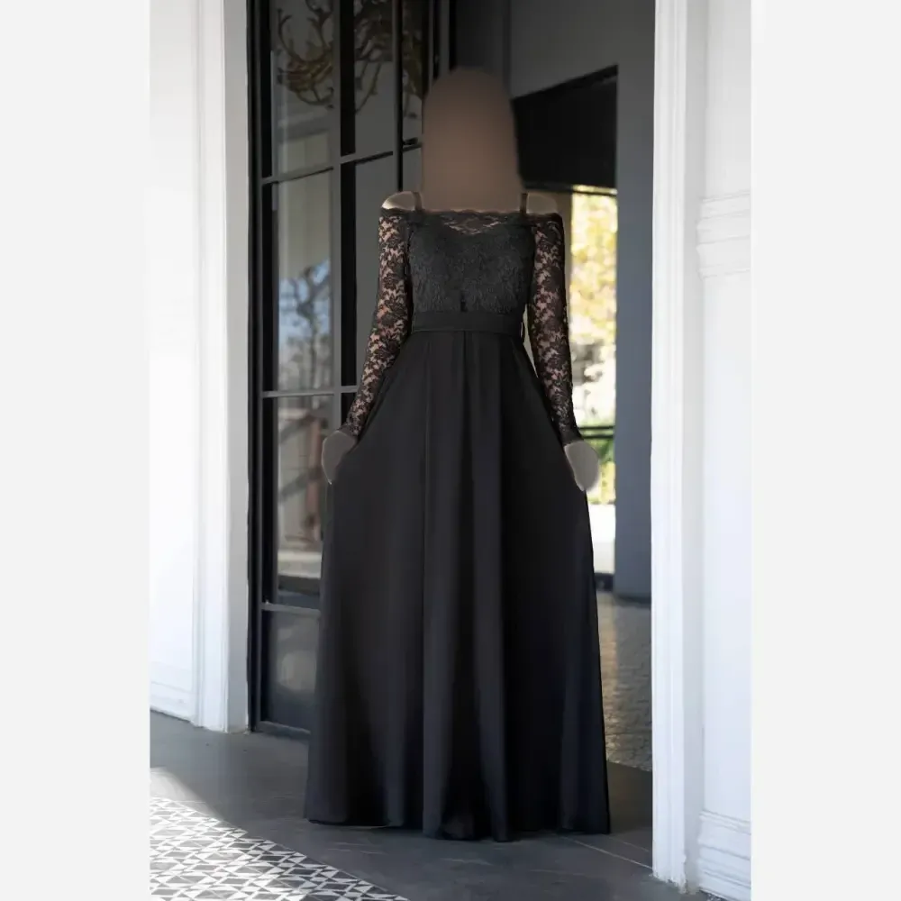 لباس مجلسی مشکی جنس دانتل برجسته و ساتن ترک بلند کمربنددار