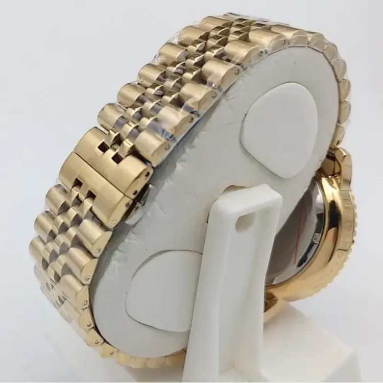 ساعت مچی مردانه الگانس طلایی صفحه سرمه ای سه موتور کرنوگراف